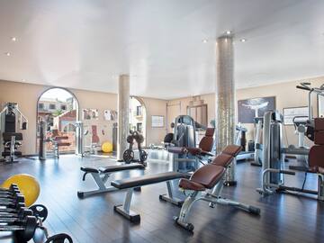 a large gym with exercise equipment