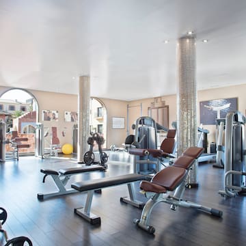 a large gym with exercise equipment