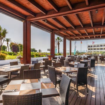 a restaurant with tables and chairs