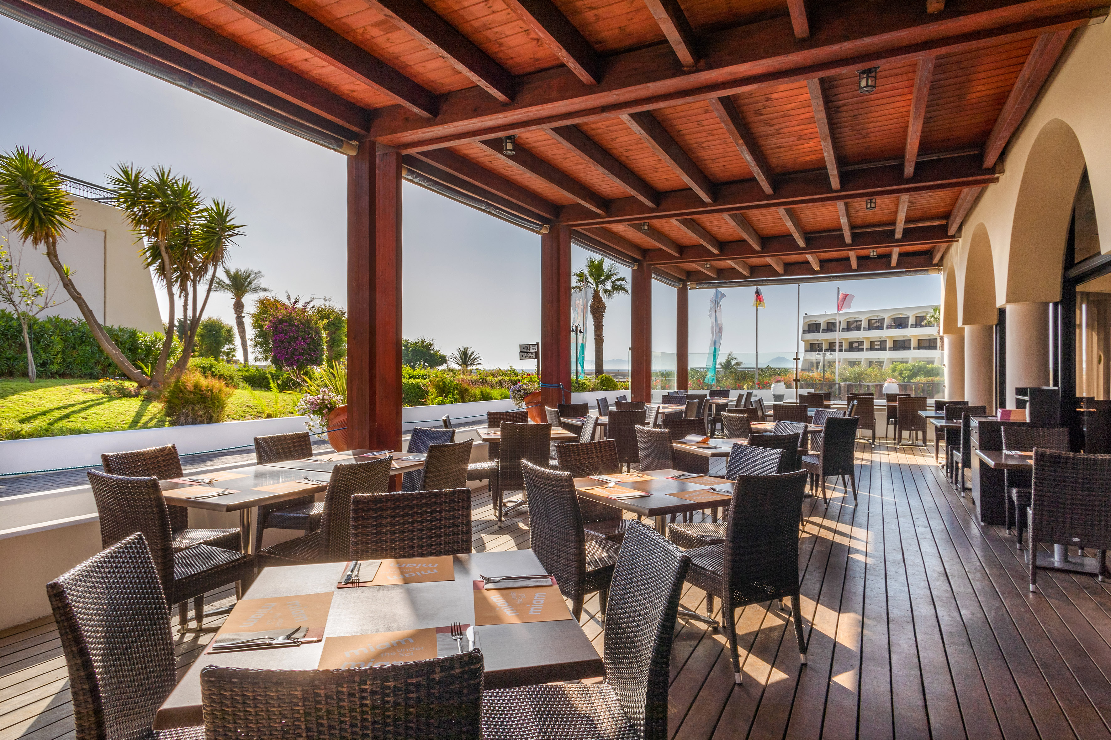 a restaurant with tables and chairs