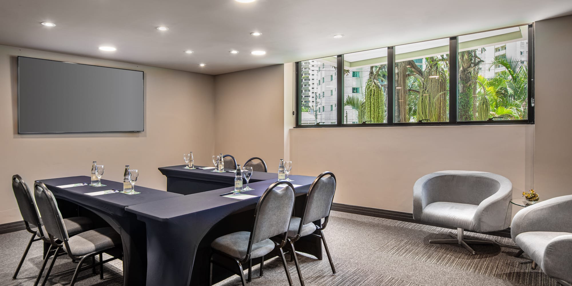 a room with a table and chairs