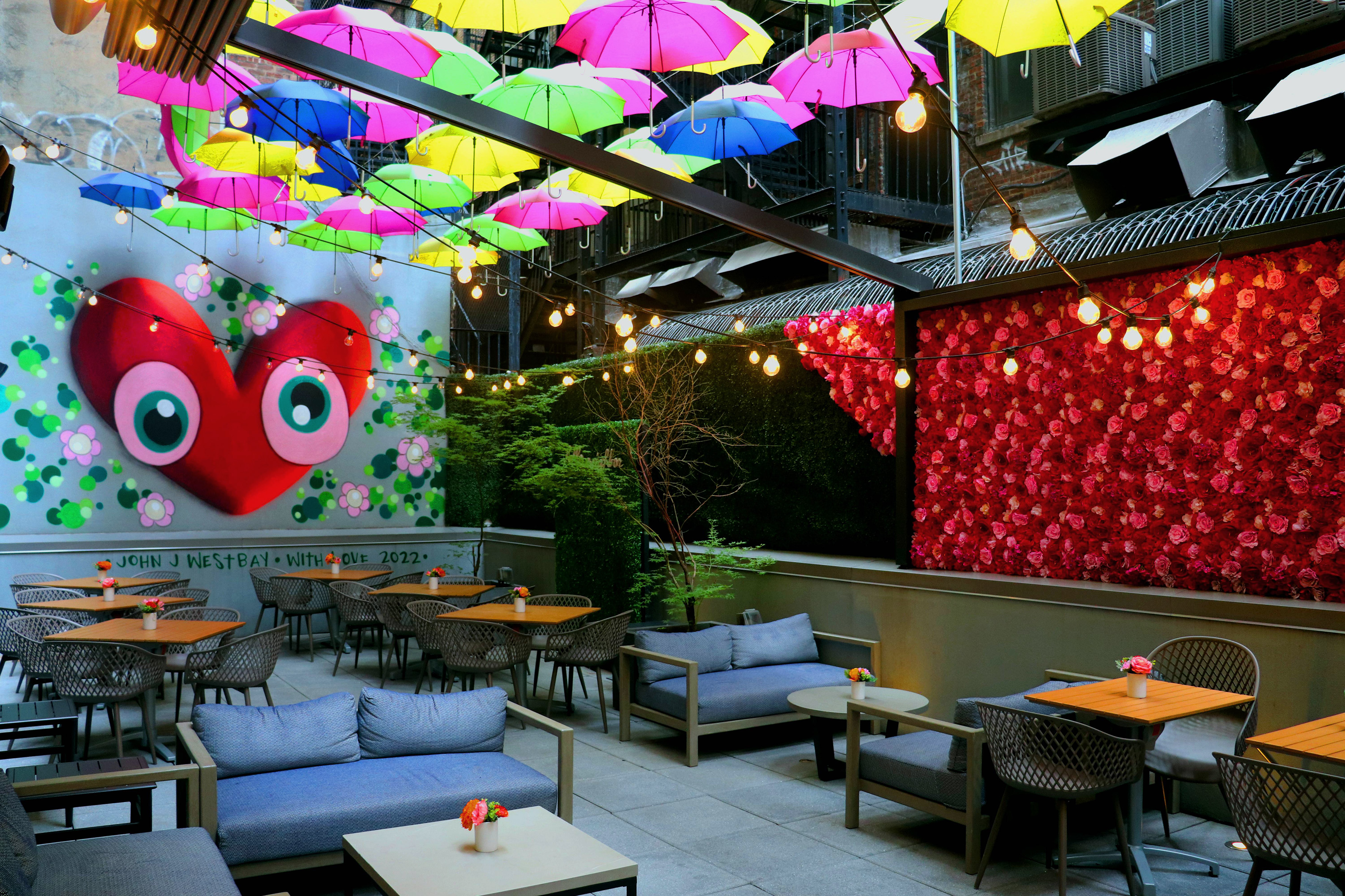 a patio with colorful umbrellas