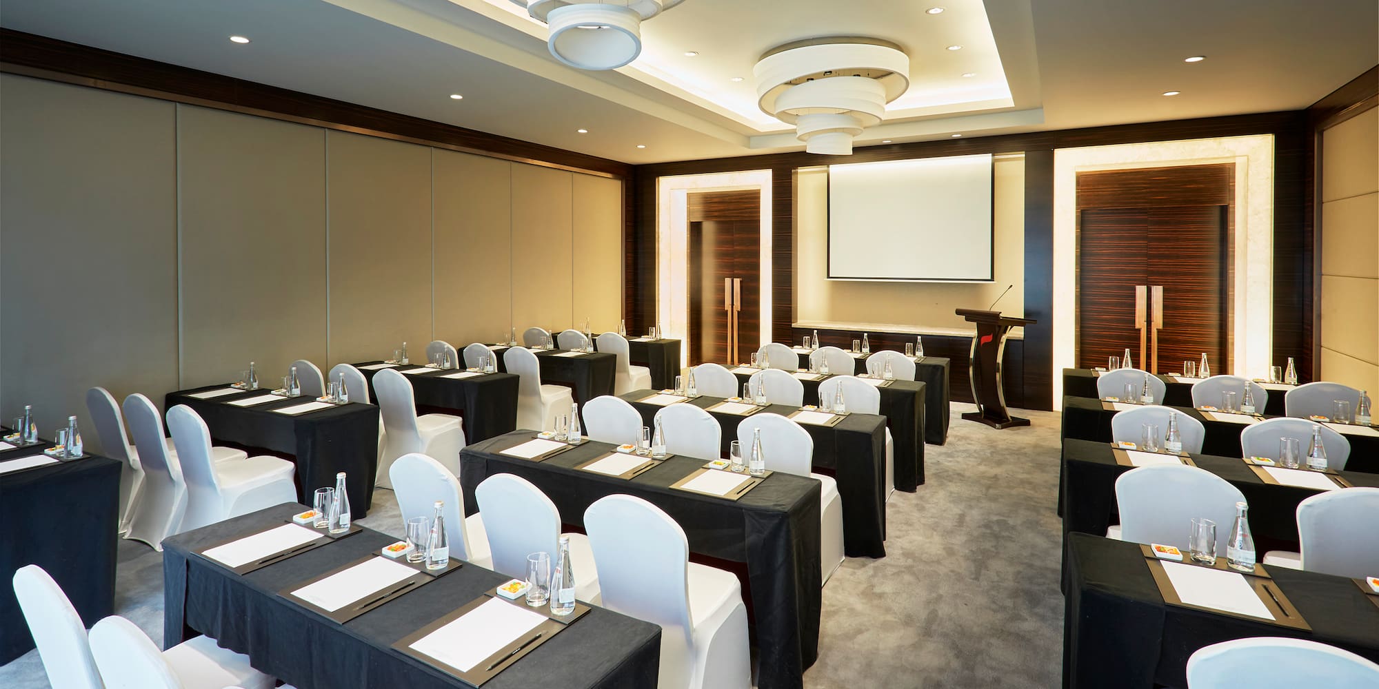 a room with tables and chairs