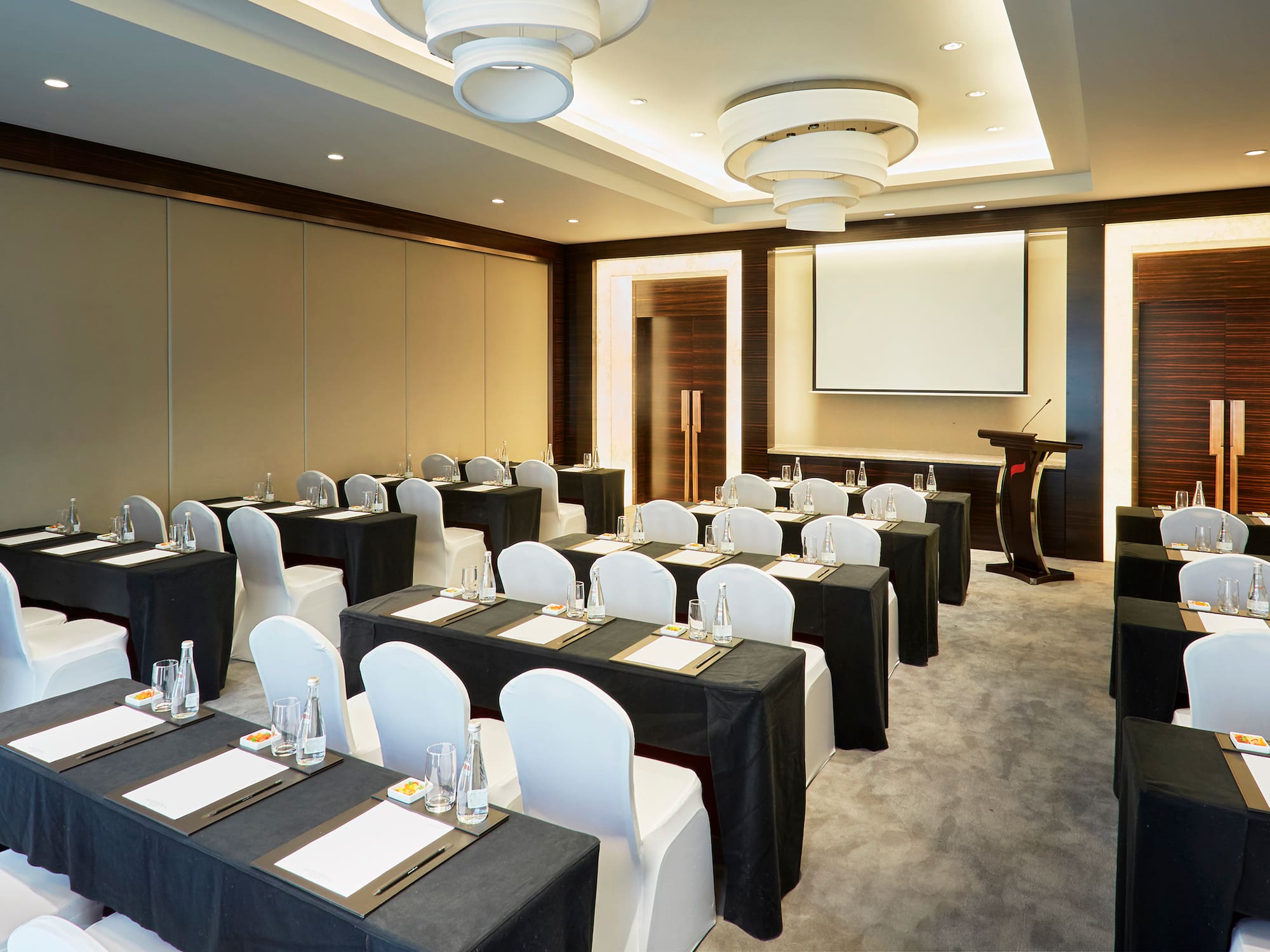 a room with tables and chairs