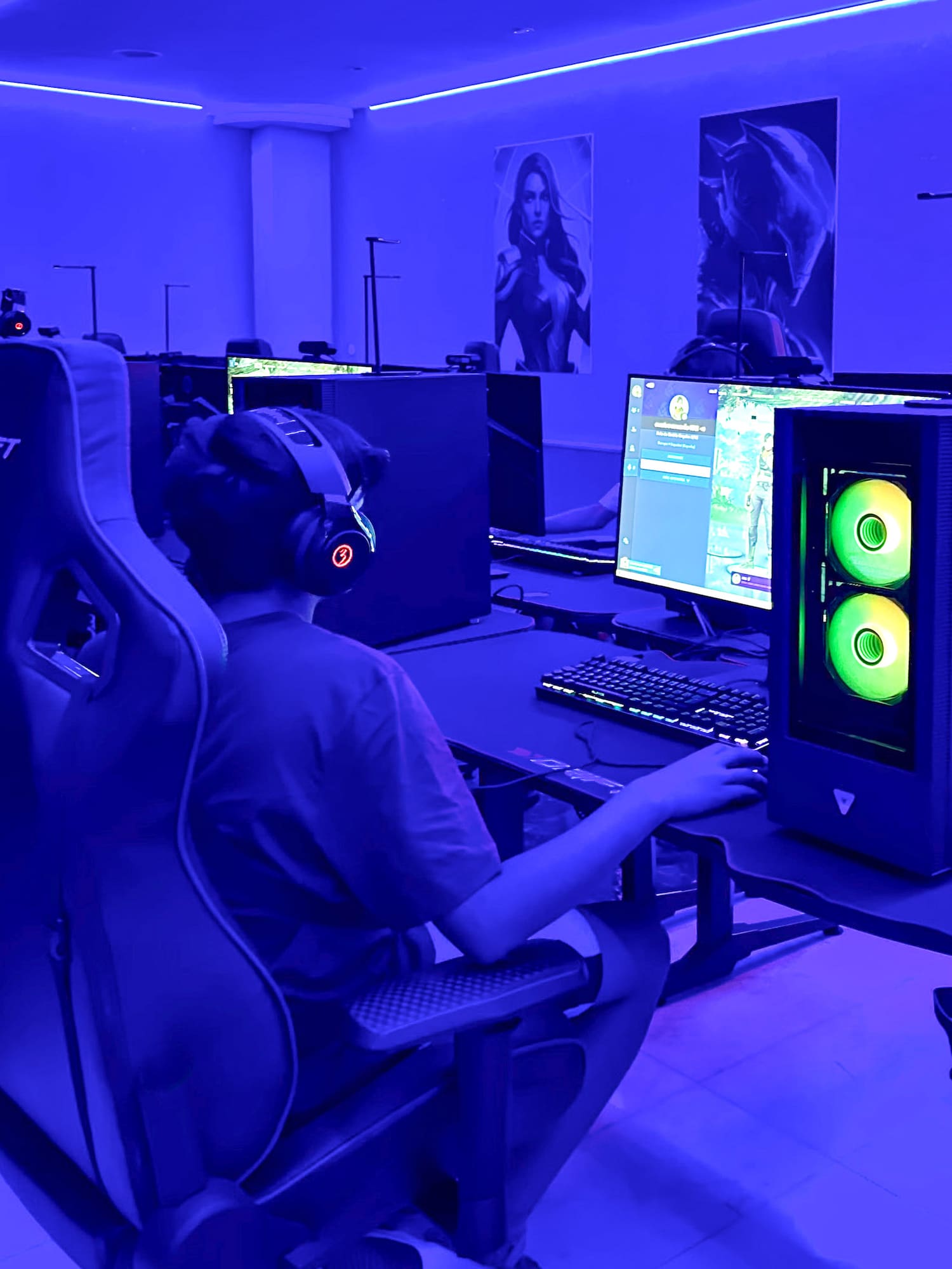 a person sitting at a computer