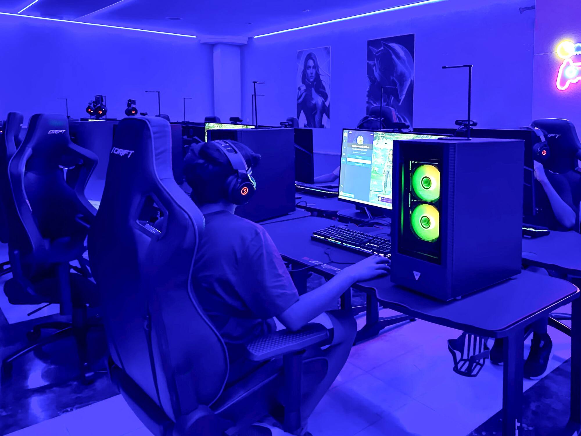 a person sitting at a computer