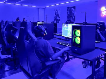 a person sitting at a computer