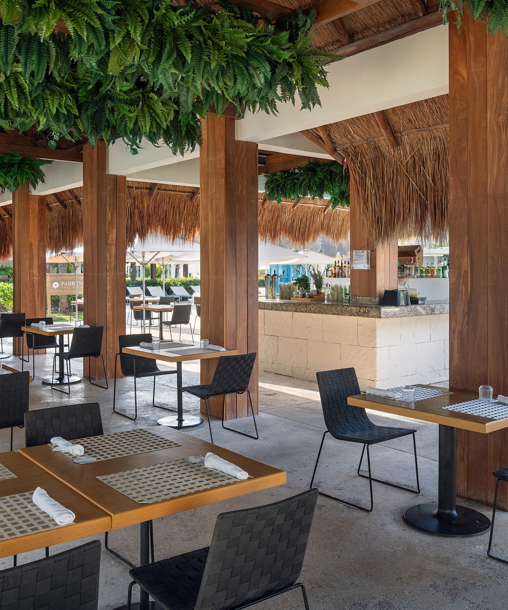 a restaurant with tables and chairs