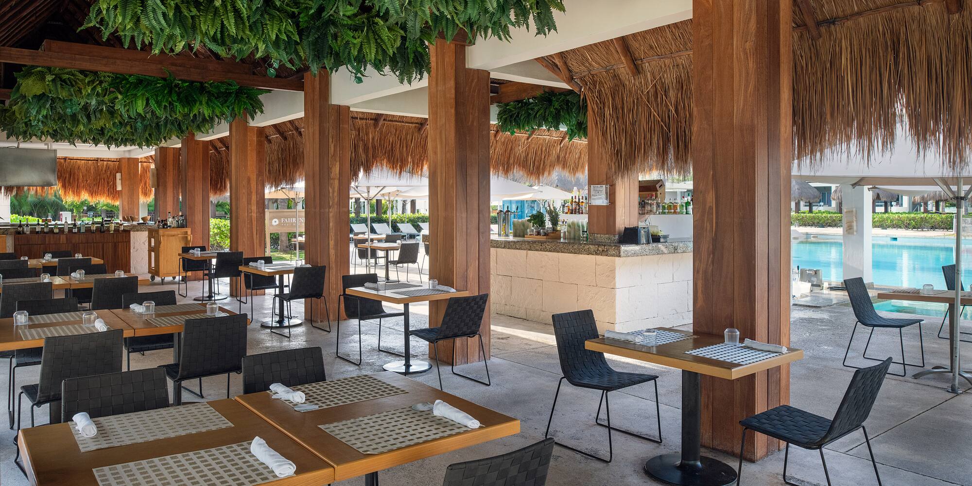 a restaurant with tables and chairs