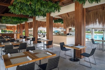 a restaurant with tables and chairs