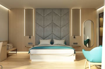 a room with a bed and a mirror