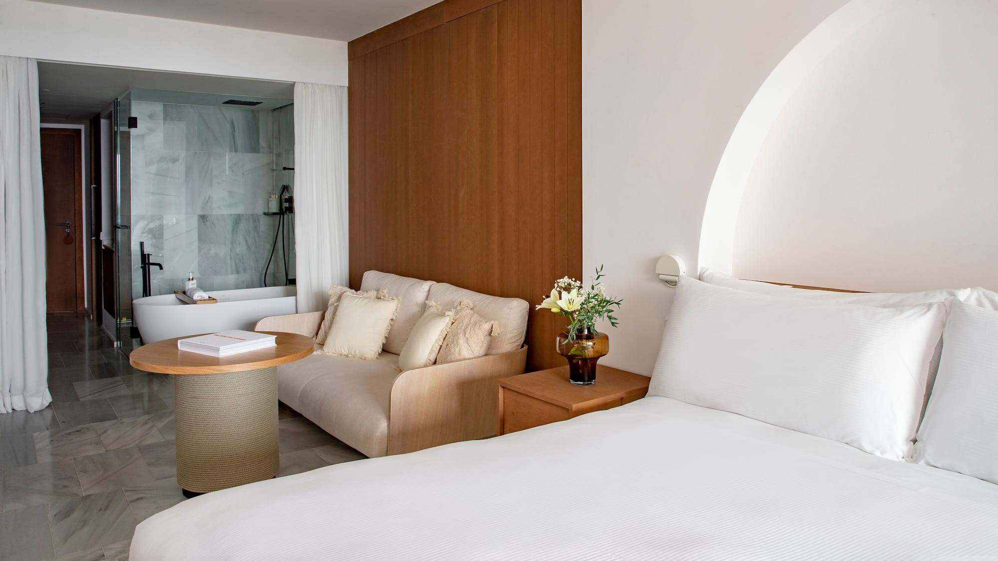 a room with a bed and a couch