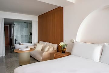 a room with a bed and a couch