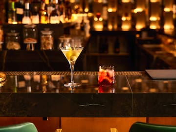 a martini glass on a bar
