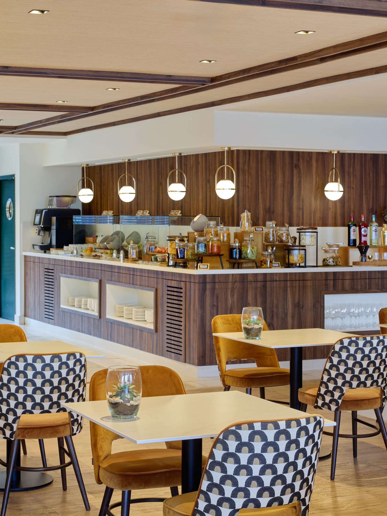 a restaurant with tables and chairs