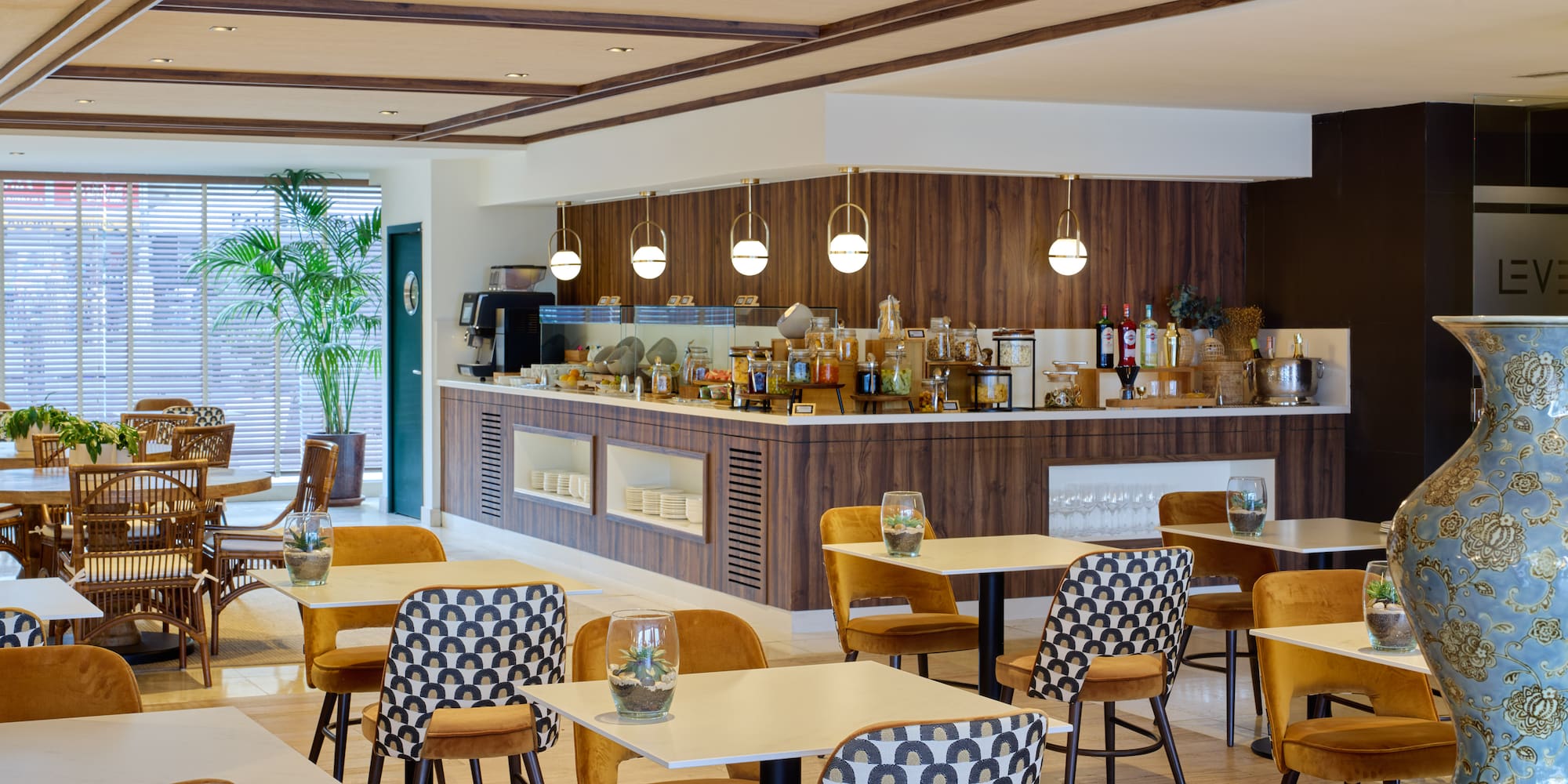 a restaurant with tables and chairs