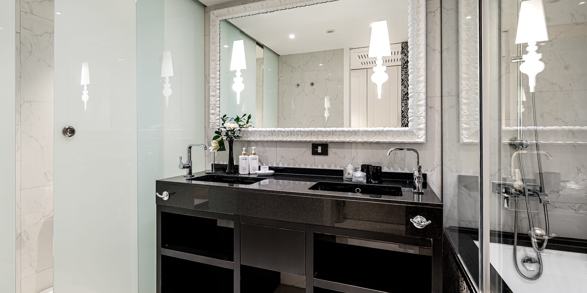 a bathroom with a mirror and sink