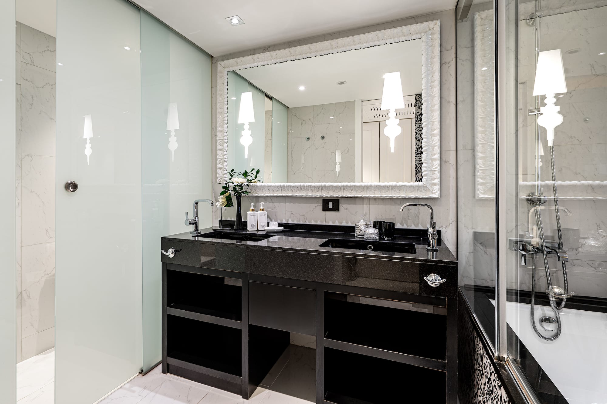 a bathroom with a mirror and sink