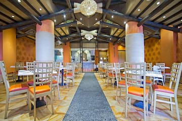 a room with tables and chairs