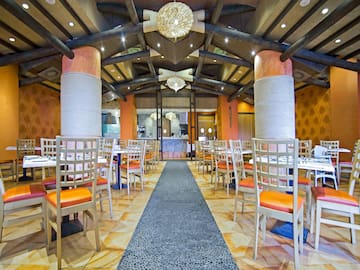 a room with tables and chairs