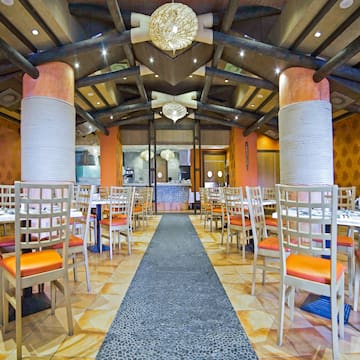 a room with tables and chairs