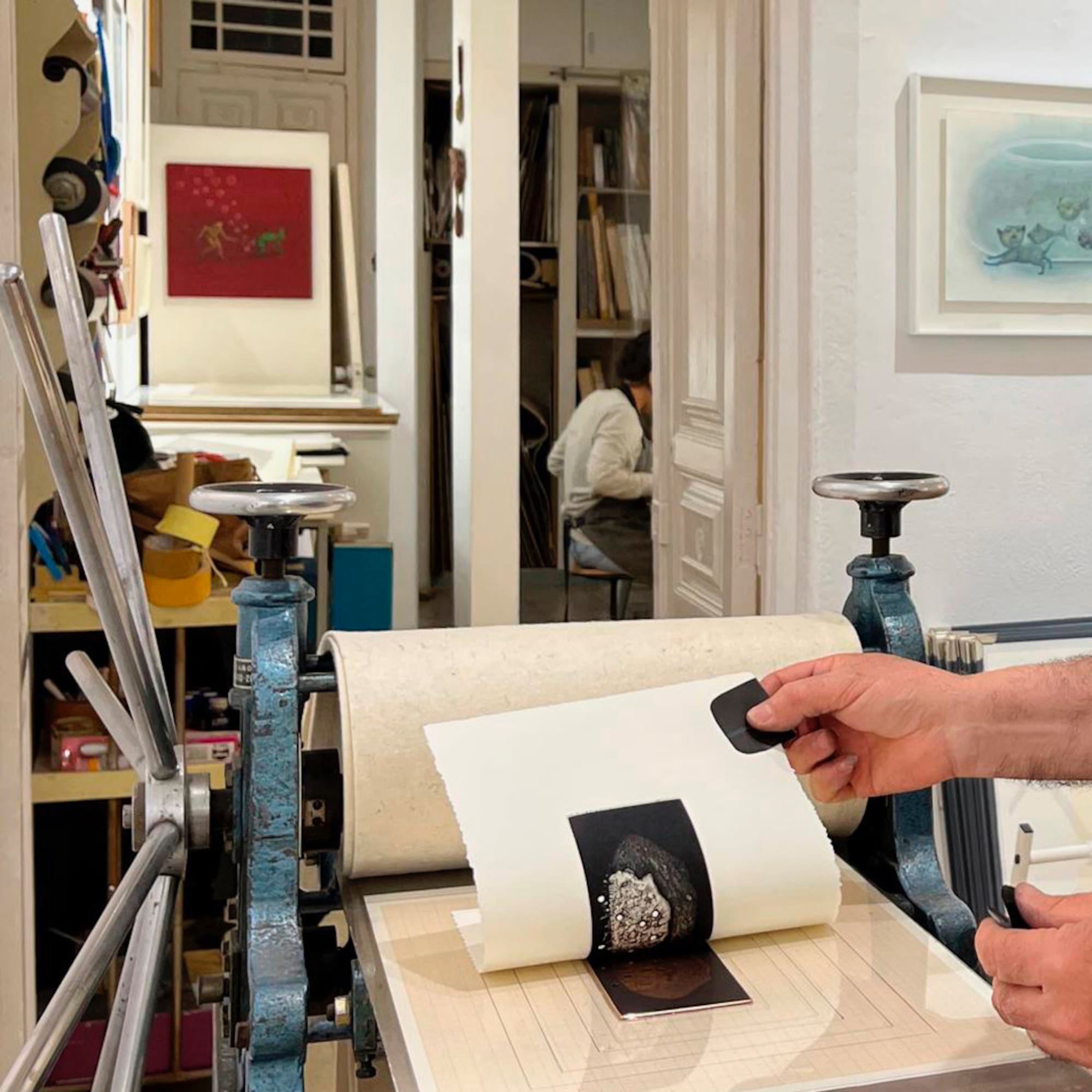 a person holding a black and white photo