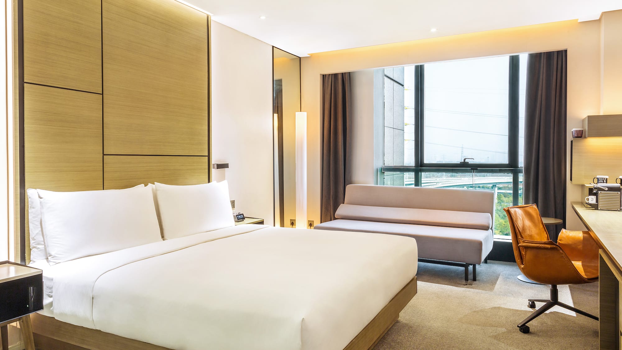 a room with a bed and a couch