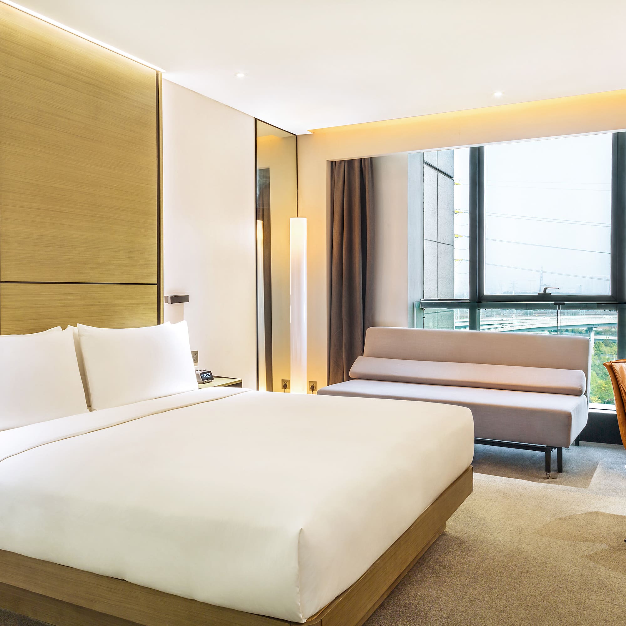 a room with a bed and a couch