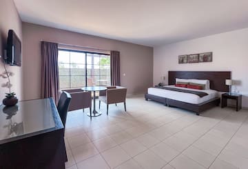 a room with a bed and a table