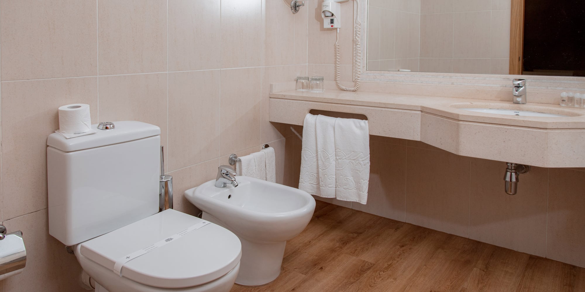 a bathroom with a toilet and sink