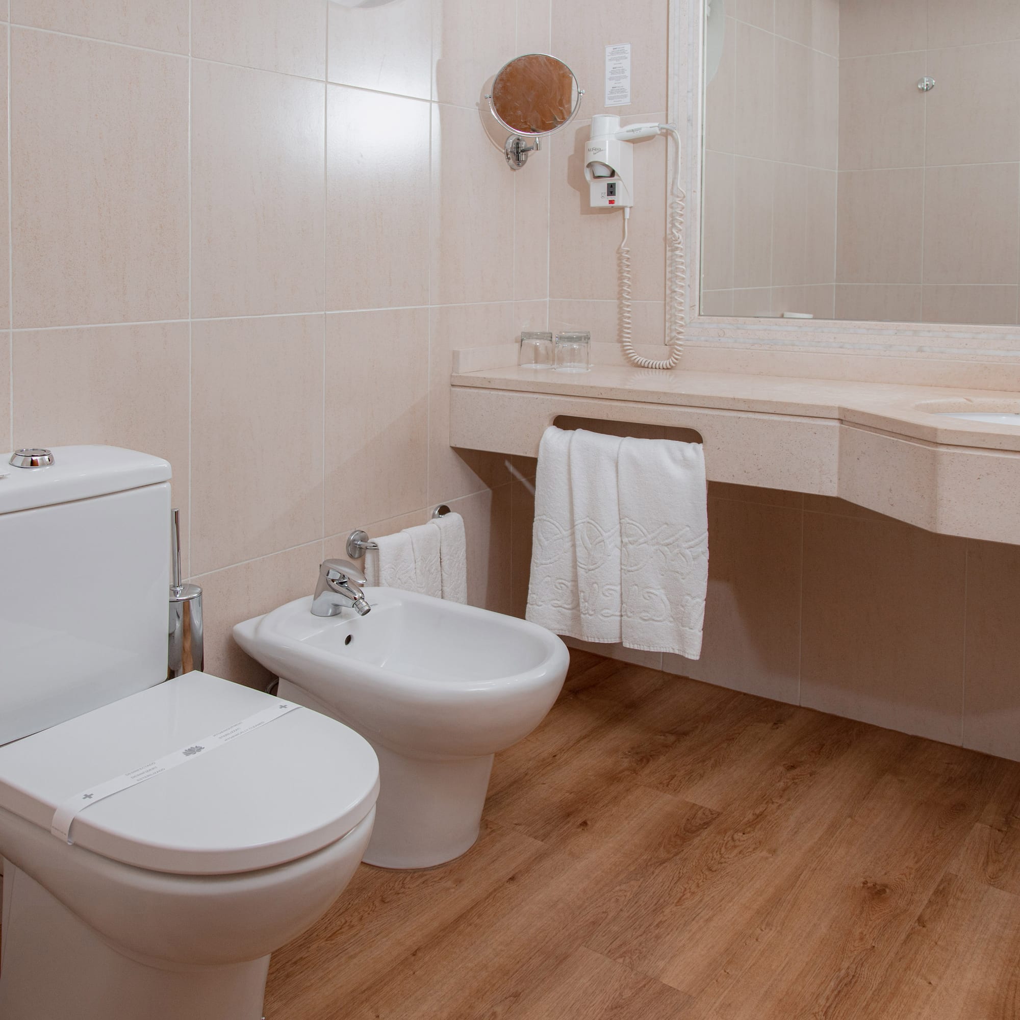 a bathroom with a toilet and sink