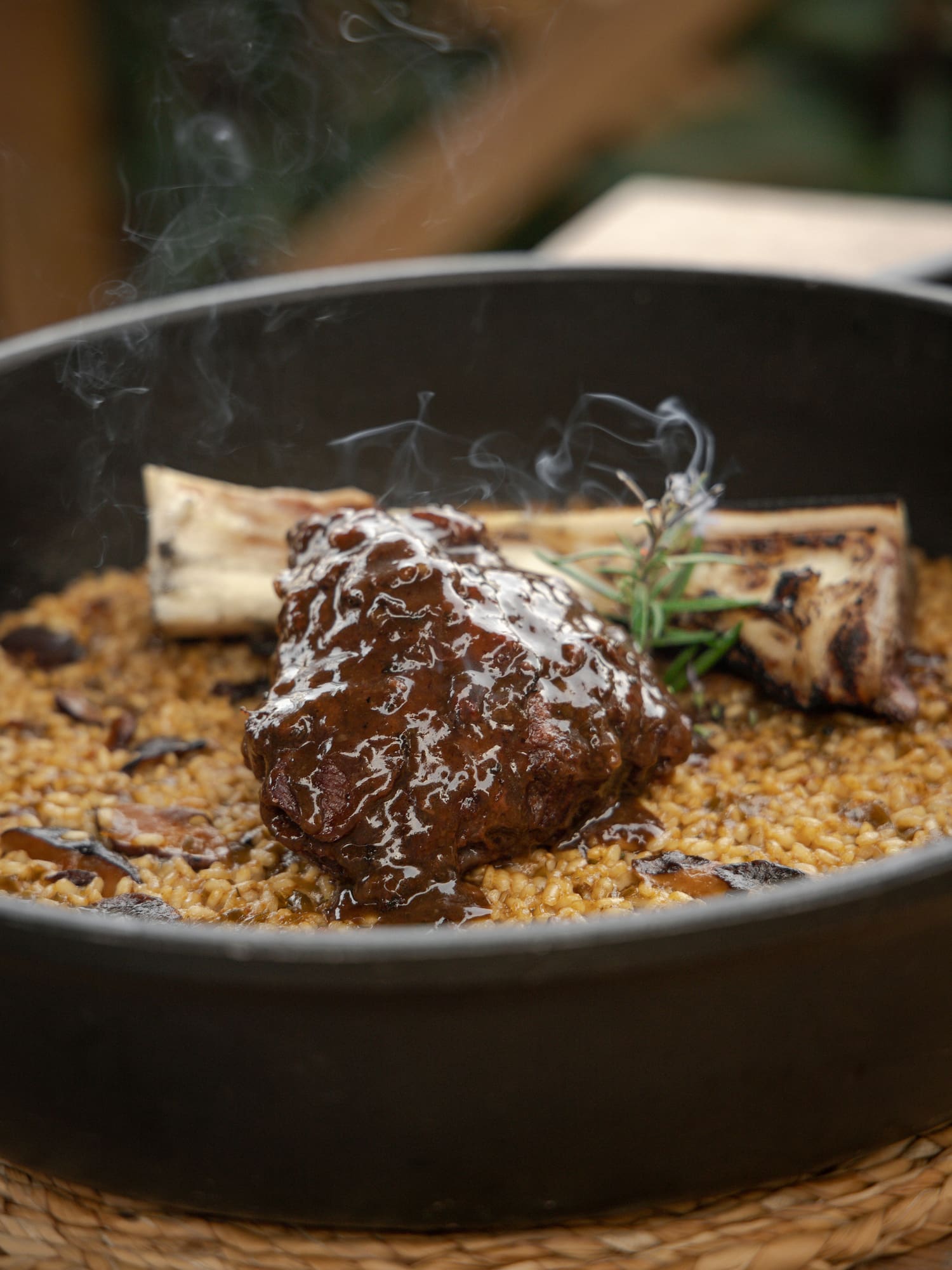 a pot of food with meat and rice