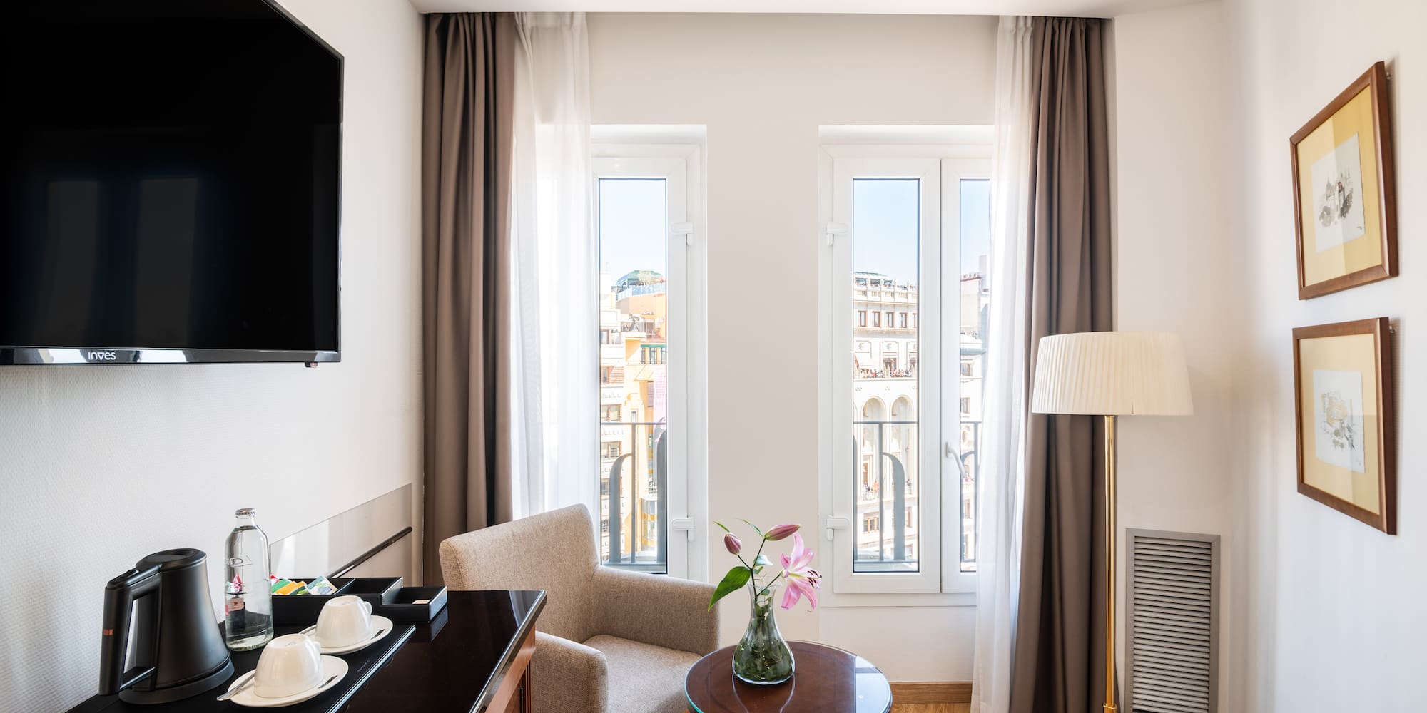 a room with a television and a table