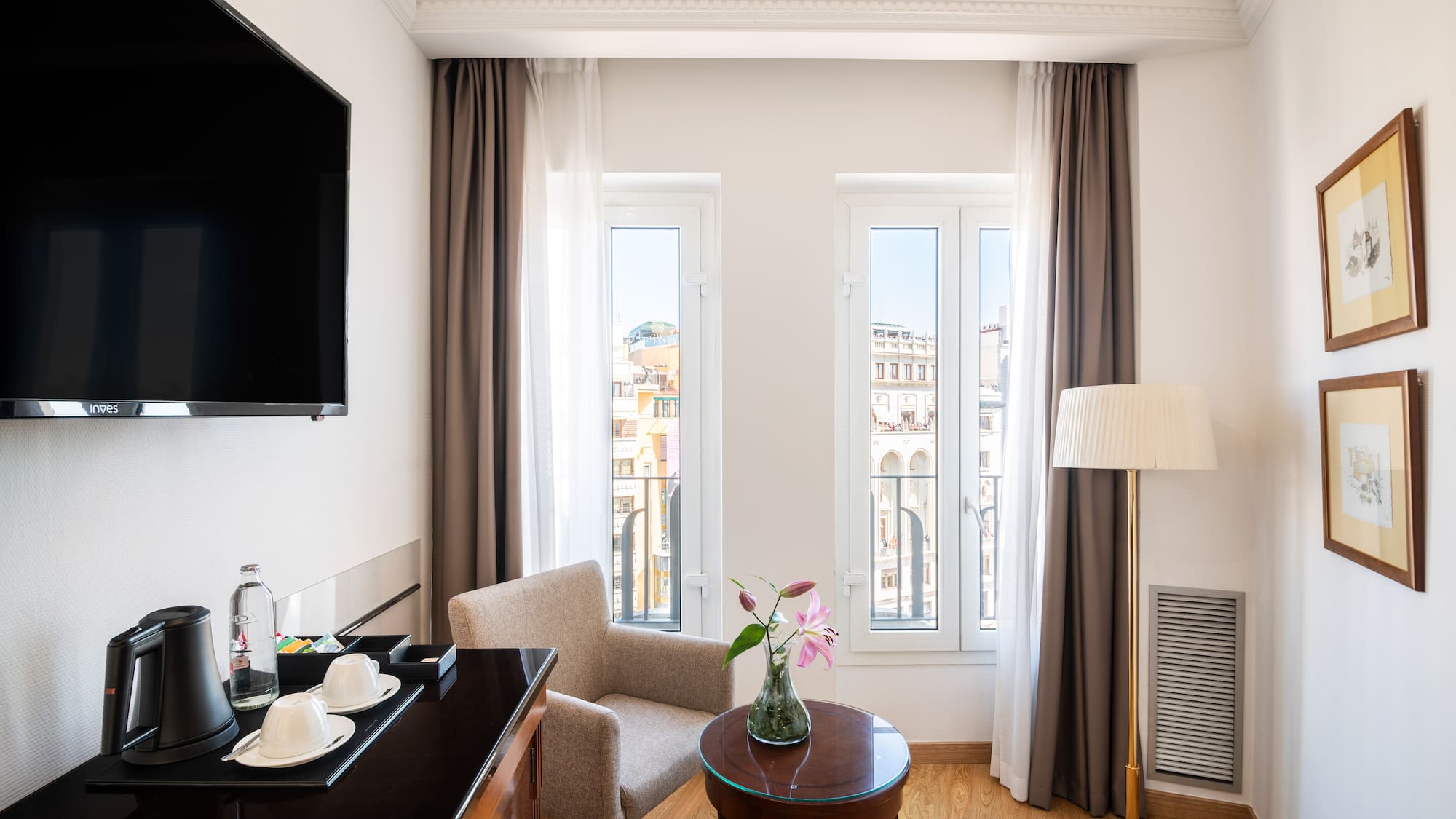 a room with a television and a table