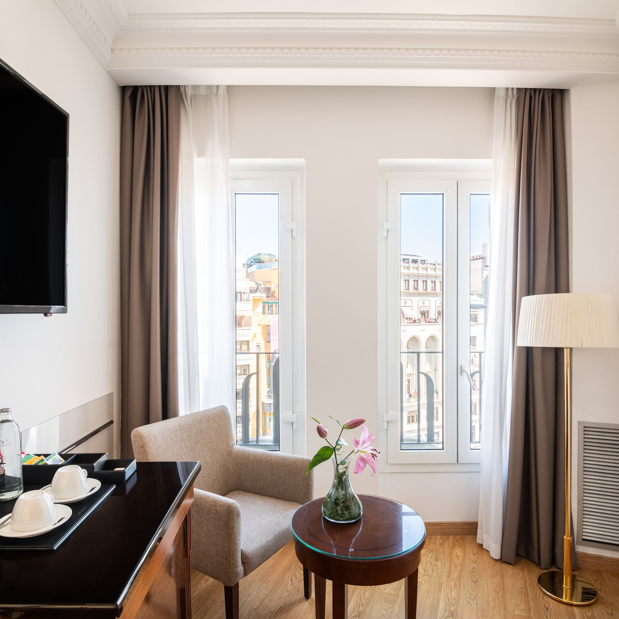 a room with a television and a table