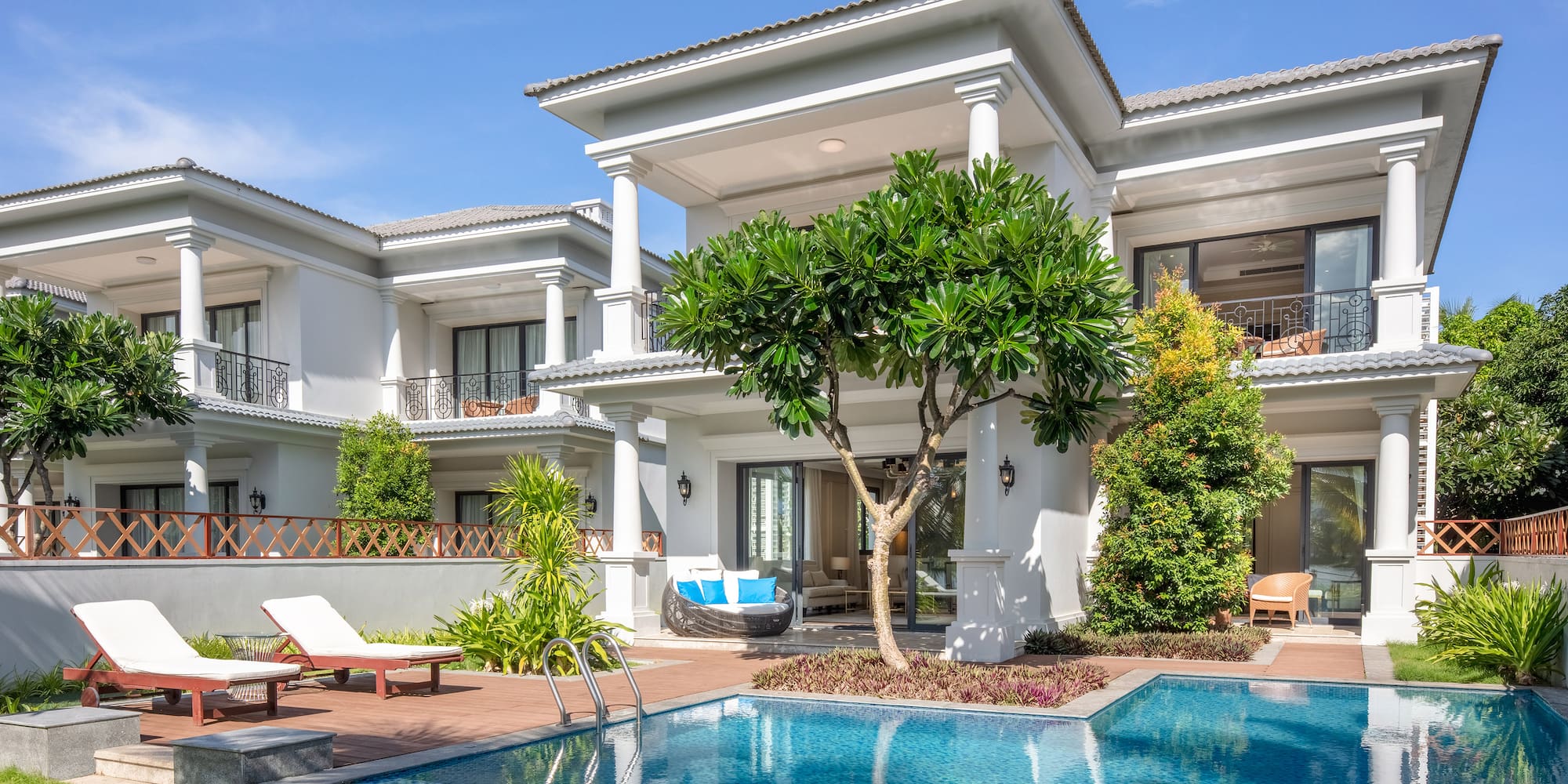 a pool in front of a house