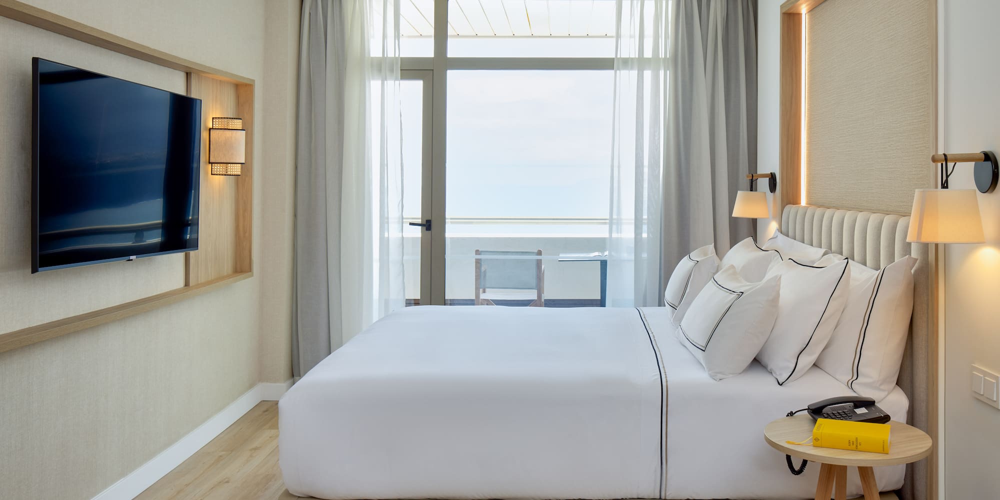 a room with a television and a bed