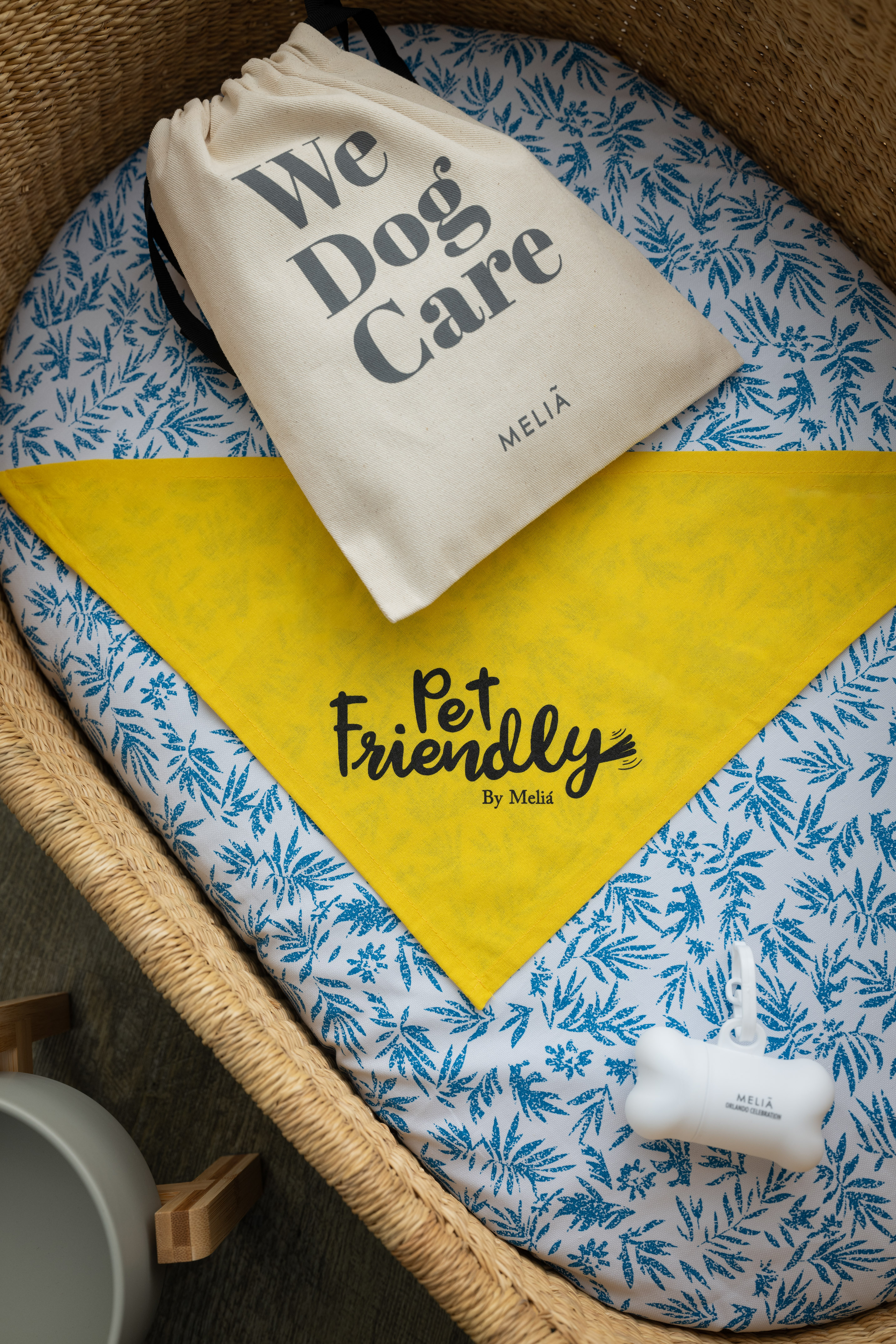 Meliá pet friendly dog bed with 'We Dog Care' bag, bandana, dispenser.