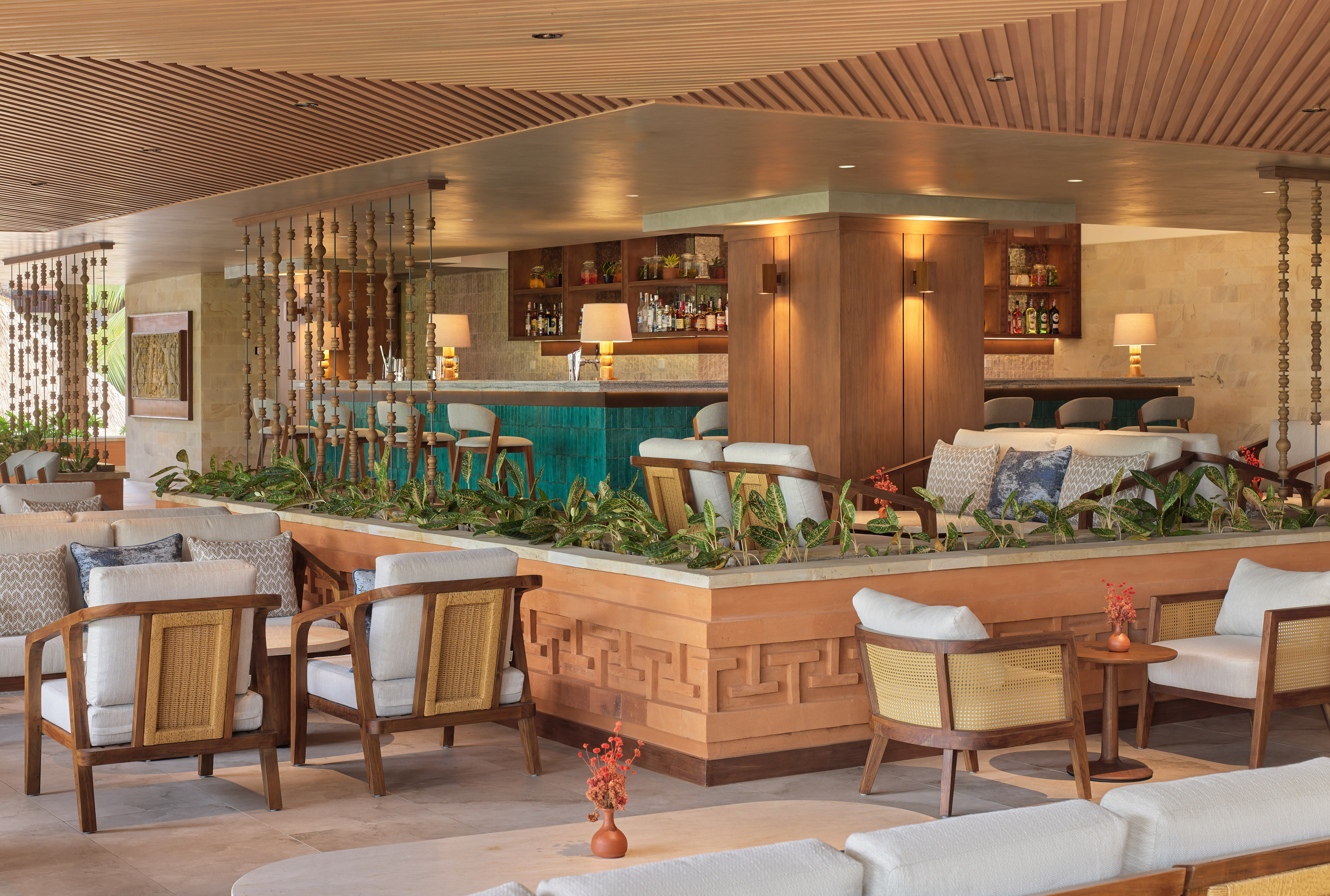 a bar with chairs and tables