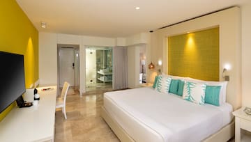 a bedroom with a bed and a table