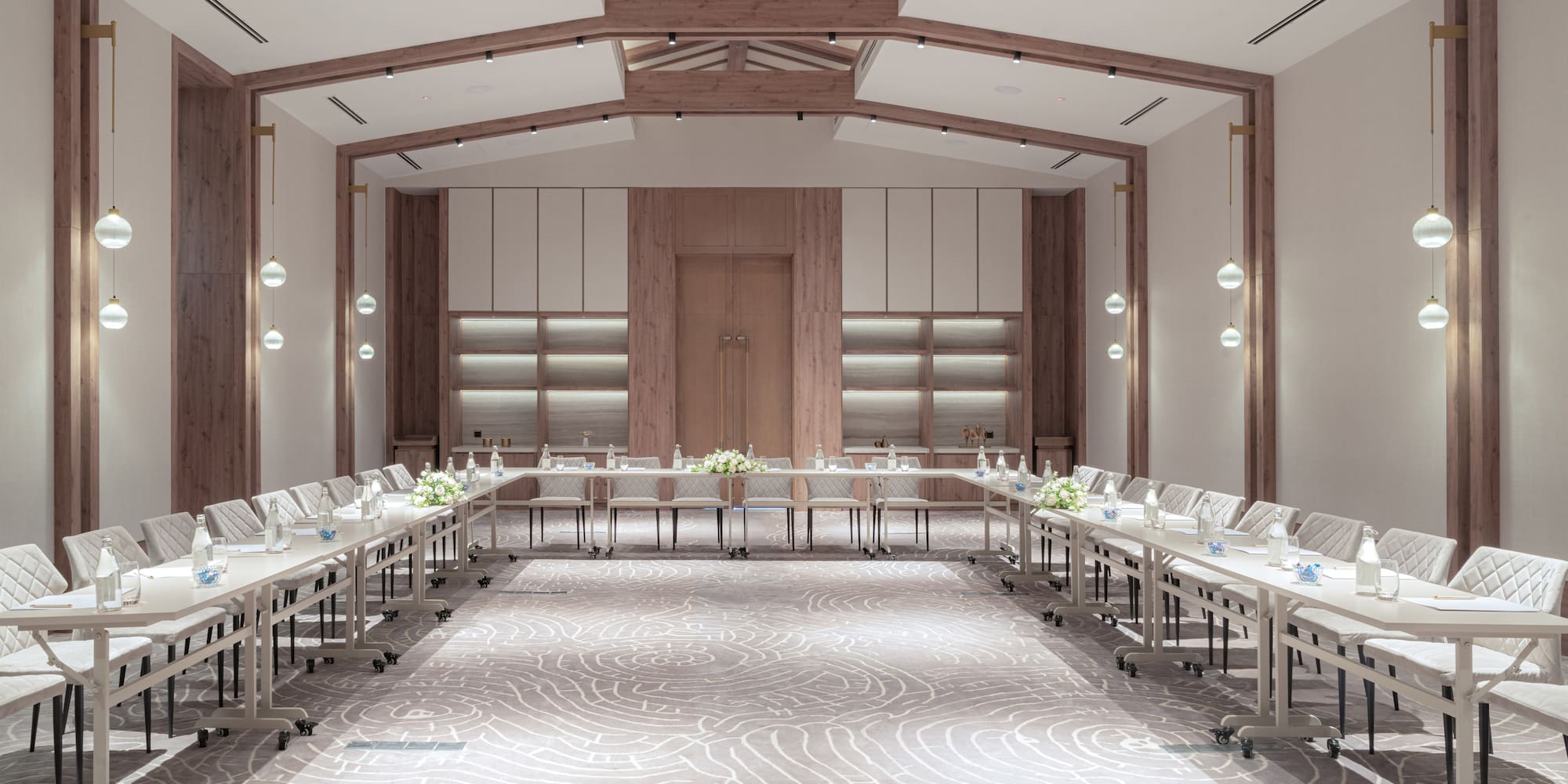 a room with tables and chairs