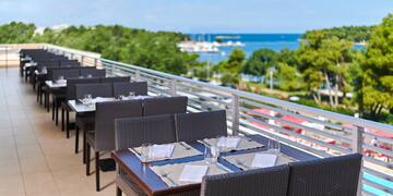 a table and chairs on a patio
