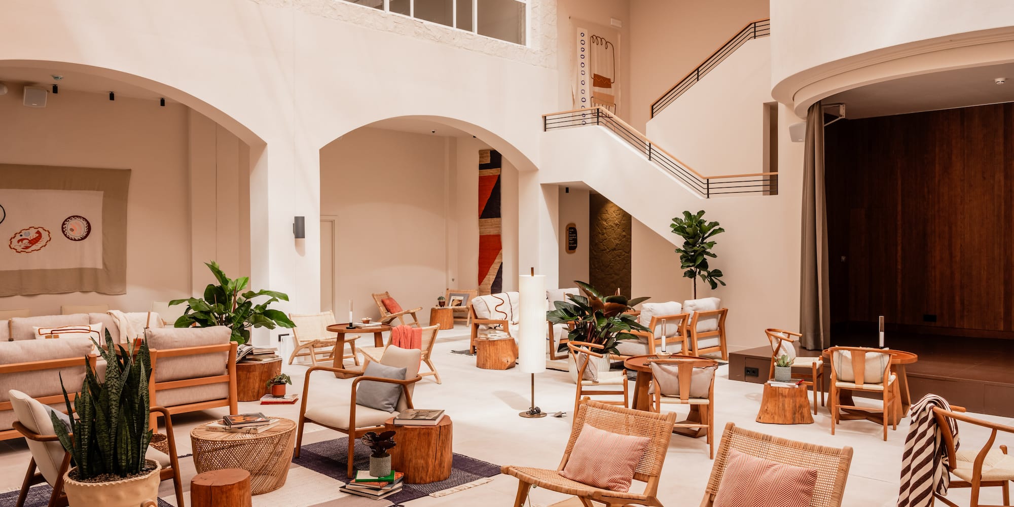 a large room with chairs and tables