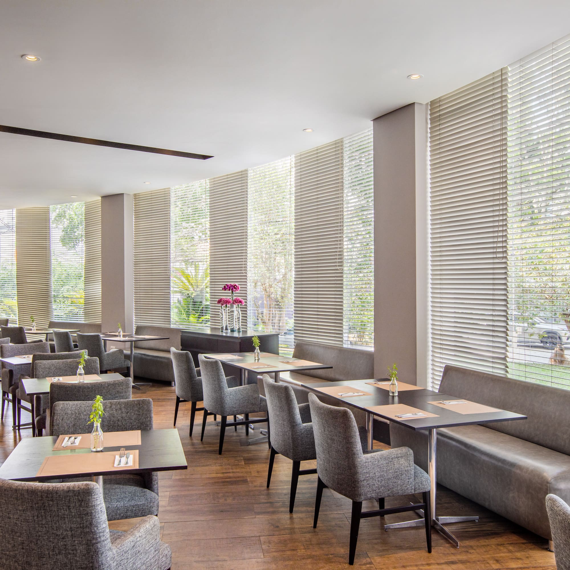 a room with tables and chairs