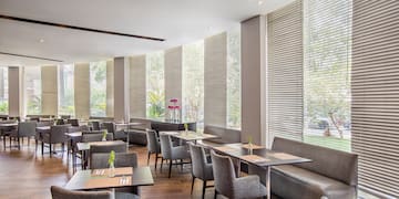 a room with tables and chairs