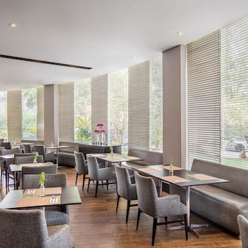 a room with tables and chairs