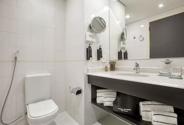 a bathroom with a sink and mirror
