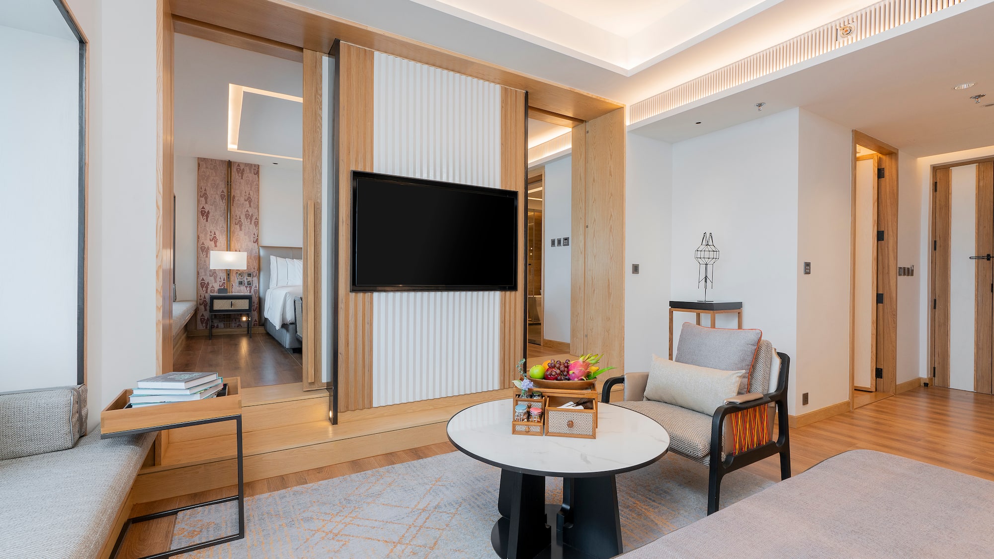 a room with a television and a bed