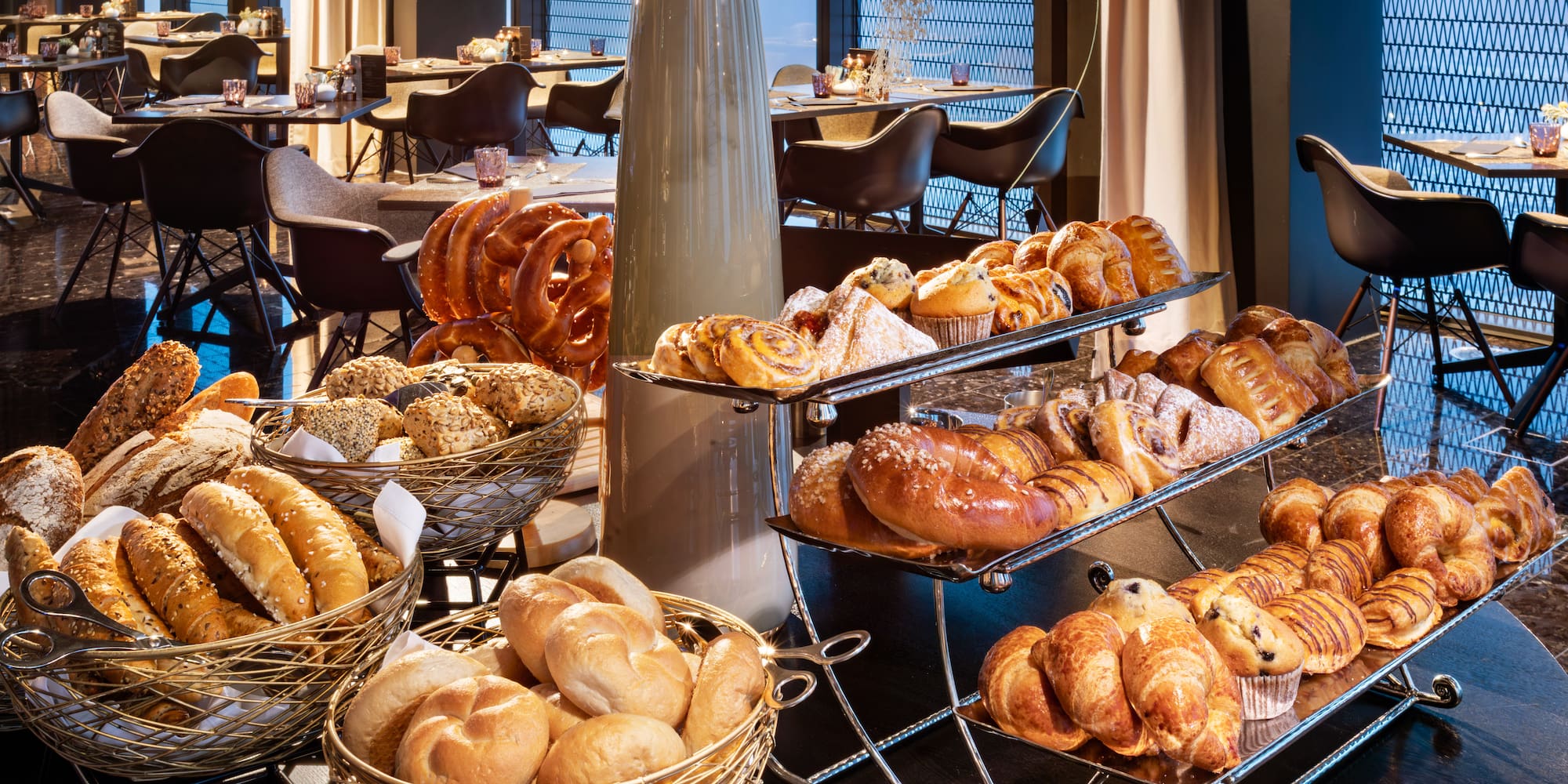 a buffet table with different types of bread