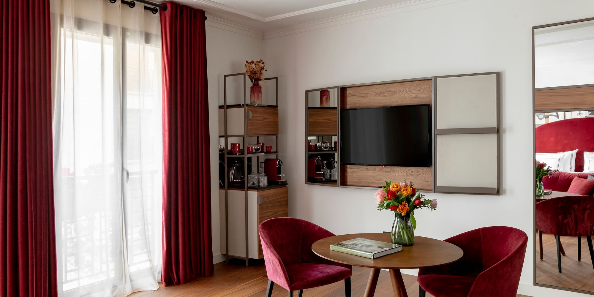 a room with a table and chairs